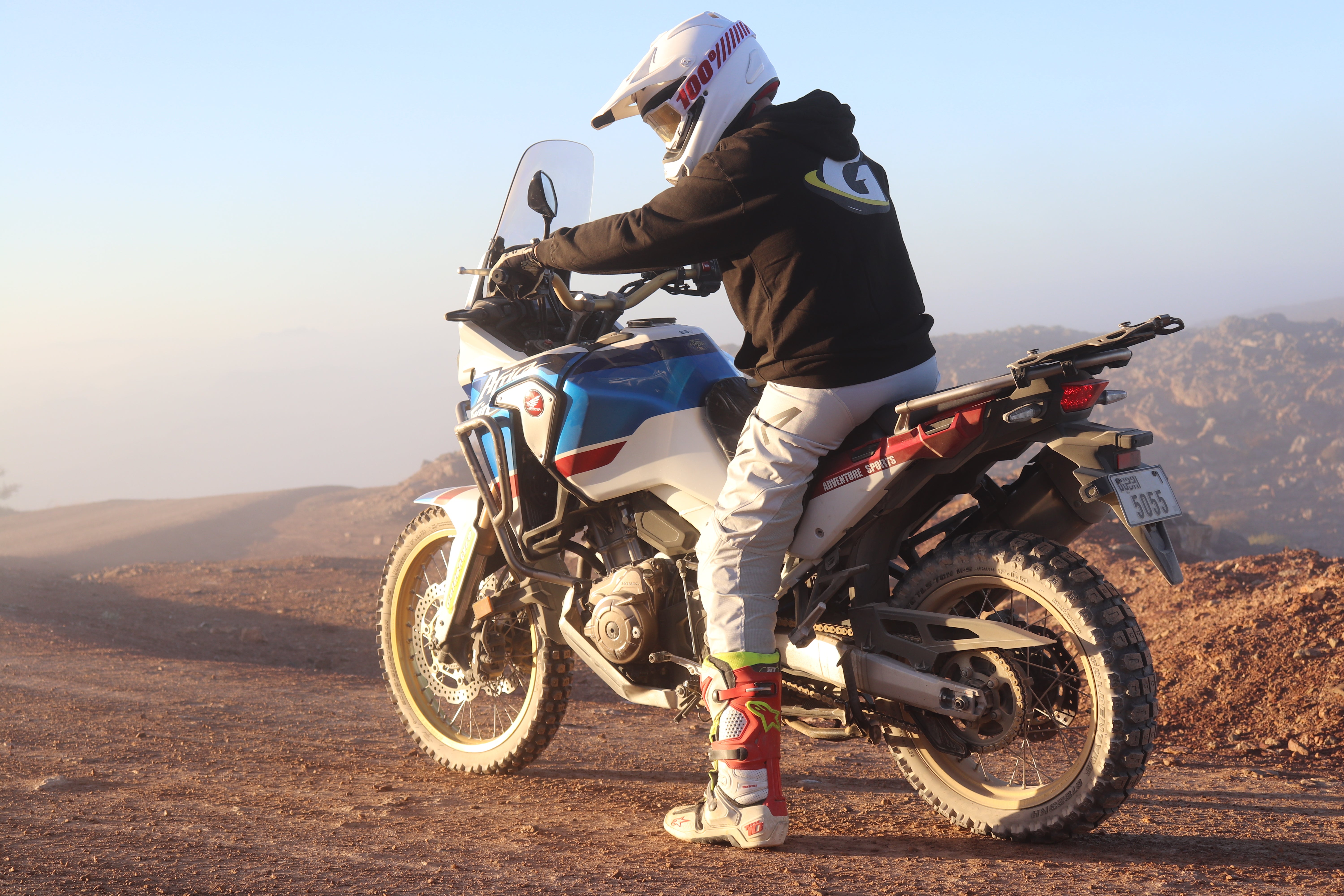 Africa Twin on dusty desert road — Dubai